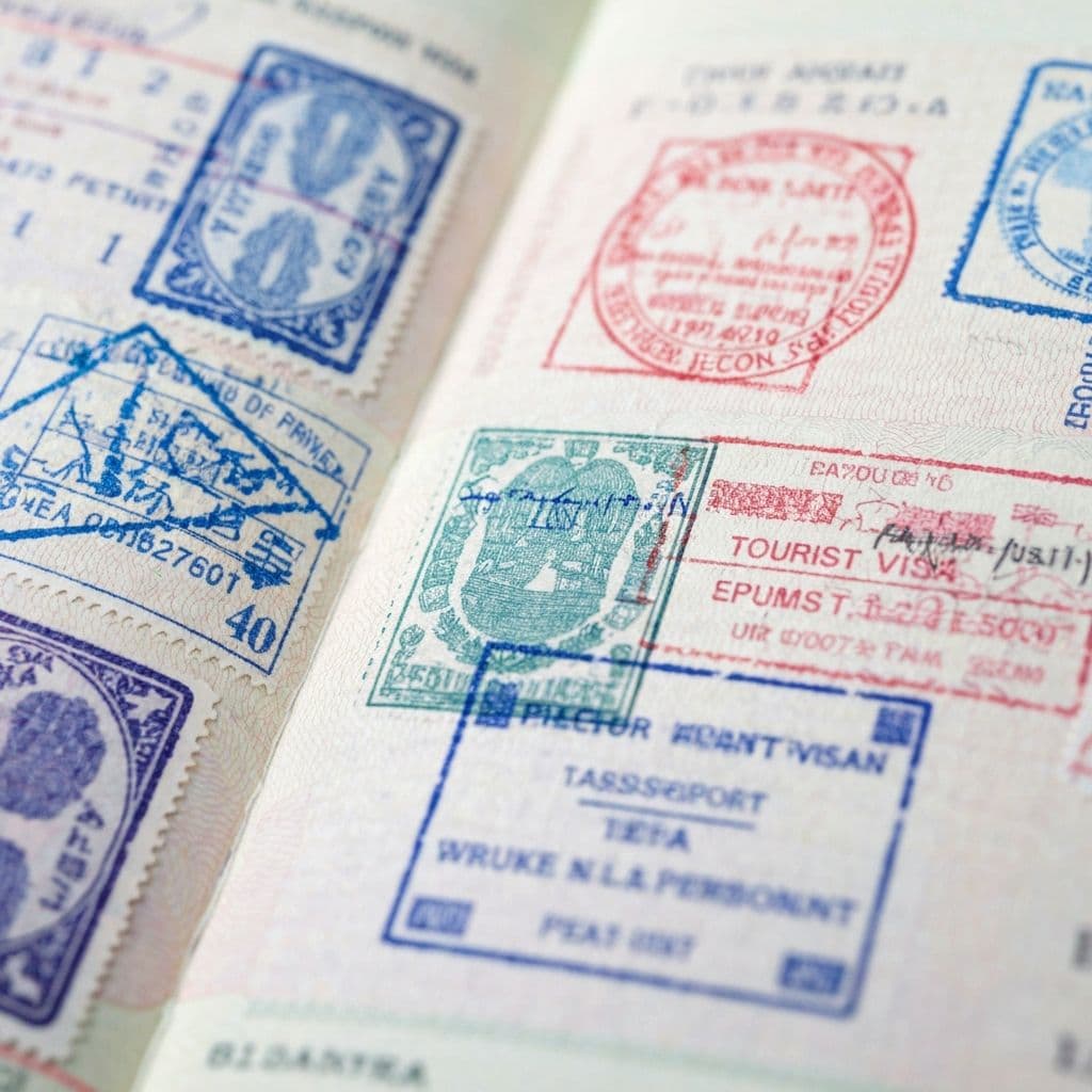 Passport pages with various visa stamps